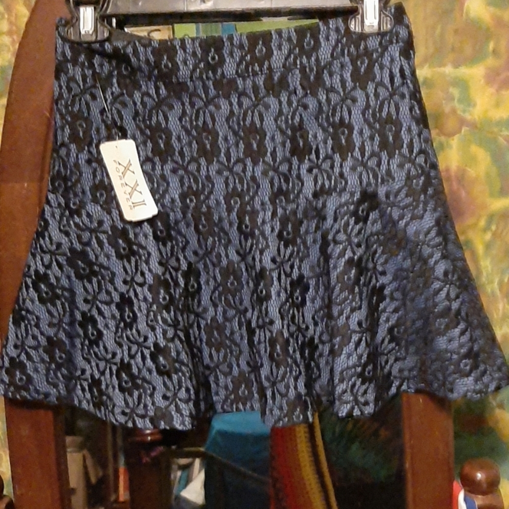 Blue with black over lace skirt.  Super cute.
